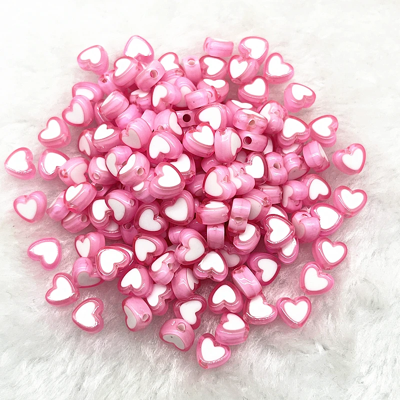 Perles d'espacement en acrylique rose brillant en forme de cœur
